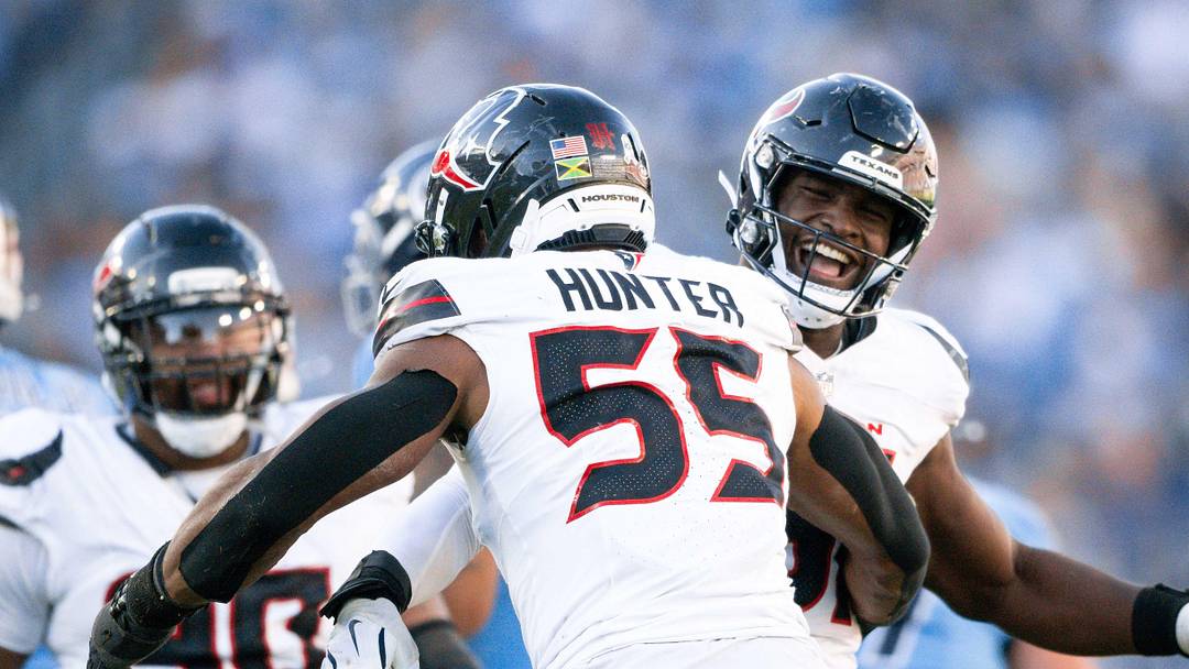 Nov 16, 2025; Nashville, Tennessee, USA;  Houston Texans defensive end Will Anderson Jr. (51) celebrates with defensive end Danielle Hunter (55) after his sack of Tennessee Titans quarterback Cameron Ward (1) during the second half at Nissan Stadium. Mandatory Credit: Steve Roberts-Imagn Images