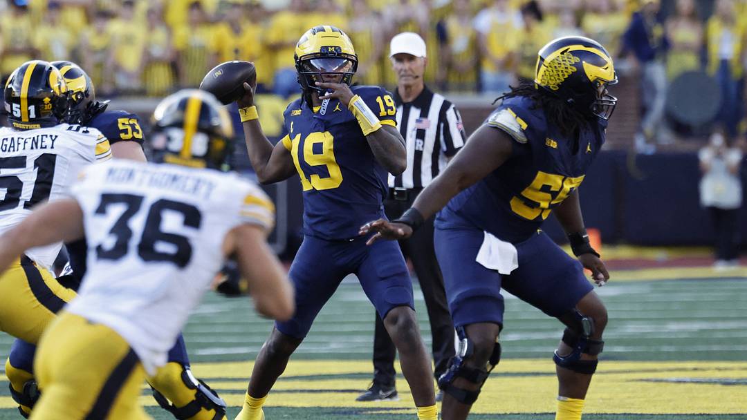 Sep 26, 2026; Ann Arbor, Michigan, USA;  Michigan Wolverines quarterback Bryce Underwood (19) passes against the Iowa Hawkeyes during the second half at Michigan Stadium.  Mandatory Credit: Rick Osentoski-Imagn Images