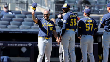 Mar 27, 2025; Bronx, New York, USA; Milwaukee Brewers pitcher Nestor Cortes (65) tips his cap towards the Yankees dugout during introductions before an opening day game against the New York Yankees at Yankee Stadium. Mandatory Credit: Brad Penner-Imagn Images