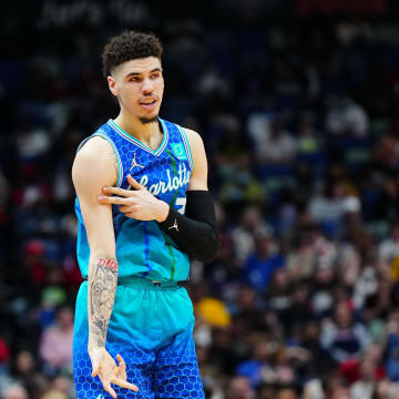 Mar 11, 2022; New Orleans, Louisiana, USA; Charlotte Hornets guard LaMelo Ball (2) reacts after a three point shot against the New Orleans Pelicans during the second quarter at Smoothie King Center. Mandatory Credit: Andrew Wevers-USA TODAY Sports