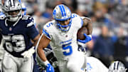 Detroit Lions running back David Montgomery (5) runs against Dallas Cowboys cornerback Shavon Revel Jr. (34) 