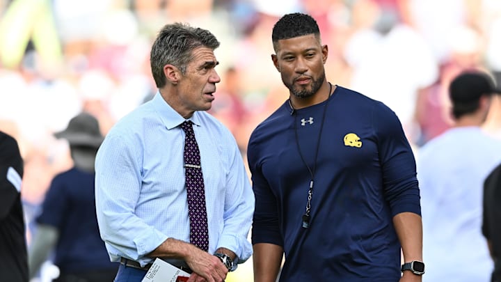 Aug 31, 2024; College Station, Texas, USA; Chris Fowler a broadcaster for ESPN, left, speaks with Notre Dame Fighting Irish head coach Marcus Freeman prior to the game against the Texas A&M Aggies at Kyle Field. Aug 31, 2024; College Station, Texas, USA; Chris Fowler a broadcaster for ESPN, left, speaks with Notre Dame Fighting Irish head coach Marcus Freeman prior to the game against the Texas A&M Aggies at Kyle Field.