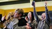 Iowa Head Coach Jan Jensen hugs Lucy Olsen as the team finds out they’re a 6 seen in the NCAA Women’s Basketball Tournament Sunday, March 16, 2025 at Carver-Hawkeye Arena in Iowa City, Iowa.