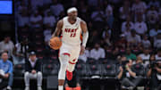 Apr 26, 2025; Miami, Florida, USA; Miami Heat center Bam Adebayo (13) dribbles the basketball against the Cleveland Cavaliers in the third quarter during game three for the first round of the 2025 NBA Playoffs at Kaseya Center. Mandatory Credit: Sam Navarro-Imagn Images