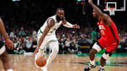 Boston Celtics forward Jaylen Brown drives to the basket against the Houston Rockets at TD Garden.