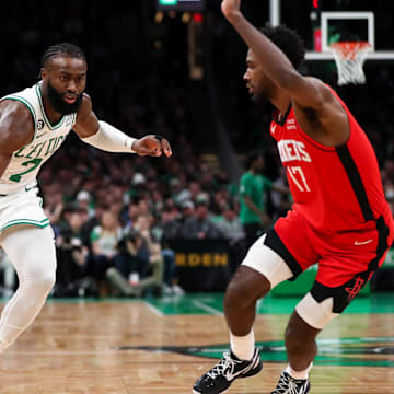 Boston Celtics forward Jaylen Brown drives to the basket against the Houston Rockets at TD Garden.