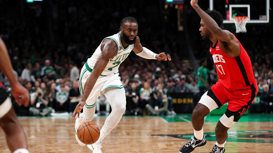 Boston Celtics forward Jaylen Brown drives to the basket against the Houston Rockets at TD Garden. | Paul Rutherford-Imagn Images