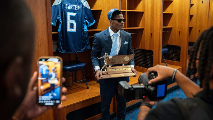 Division 1 Class 6A Mr. Football Award winner Boo Carter has his picture taken during the Mr. Football Awards at Nissan Stadium in Nashville, Tenn., Tuesday, Dec. 5, 2023.