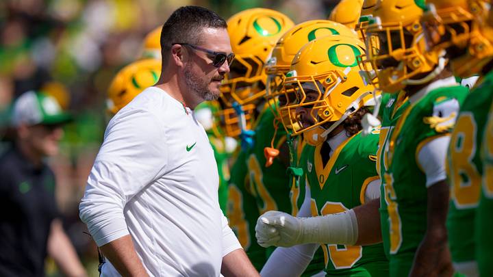 Oregon head coach Dan Lanning walks the field during warmups as the Oregon Ducks host the Boise State Broncos on Sept. 5, 2026, at Autzen Stadium in Eugene, Oregon.