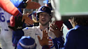 Oct 9, 2025; Chicago, Illinois, USA; Chicago Cubs right fielder Kyle Tucker (30) reacts in the dug out after hitting a home run against the Milwaukee Brewers during the seventh inning for game four of the NLDS round for the 2025 MLB playoffs at Wrigley Field. Mandatory Credit: David Banks-Imagn Images