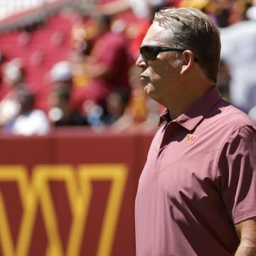 Aug 13, 2022; Landover, Maryland, USA; Washington Commanders defensive coordinator Jack Del Rio stands on the field during warmups prior to the Commanders' game against the Carolina Panthers at FedExField. Mandatory Credit: Geoff Burke-USA TODAY Sports