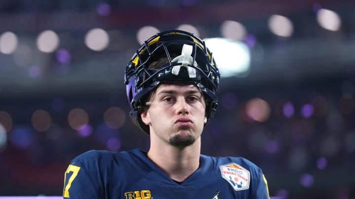 Dec 31, 2022; Glendale, Arizona, USA; Michigan Wolverines tight end Marlin Klein (17) walks off the field after losing to the TCU Horned Frogs in the 2022 Fiesta Bowl at State Farm Stadium. Mandatory Credit: Joe Camporeale-USA TODAY Sports