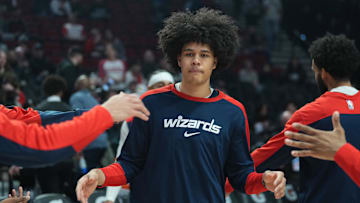 Mar 17, 2025; Portland, Oregon, USA; Washington Wizards forward Kyshawn George (18) is introduced before the game against the Portland Trail Blazers at Moda Center. Mandatory Credit: Soobum Im-Imagn Images