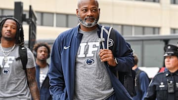 Penn State Nittany Lions interim head coach Terry Smith enters Kinnick Stadium before the game against the Iowa Hawkeyes. 