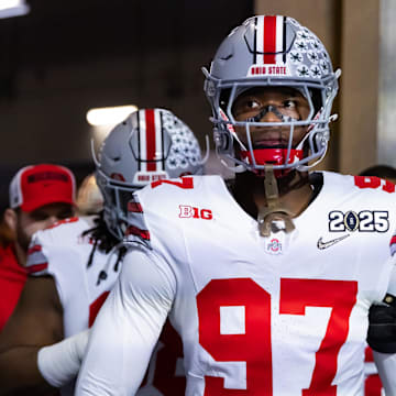 Jan 20, 2025; Atlanta, GA, USA; Ohio State Buckeyes defensive end Kenyatta Jackson Jr. (97) against the Notre Dame Fighting Irish during the CFP National Championship college football game at Mercedes-Benz Stadium. Mandatory Credit: Mark J. Rebilas-Imagn Images