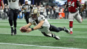 Sep 23, 2018; Atlanta, GA, USA; New Orleans Saints quarterback Drew Brees (9) dives for a rushing touchdown in the fourth quarter against the Atlanta Falcons at Mercedes-Benz Stadium. Mandatory Credit: Jason Getz-USA TODAY Sports