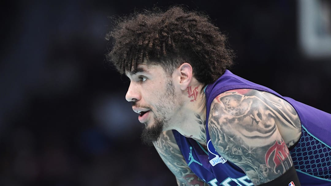 Nov 26, 2025; Charlotte, North Carolina, USA; Charlotte Hornets guard LaMelo Ball (1) in a time out during the first half against the New York Knicks at the Spectrum Center. Nov 26, 2025; Charlotte, North Carolina, USA; Charlotte Hornets guard LaMelo Ball (1) in a time out during the first half against the New York Knicks at the Spectrum Center.