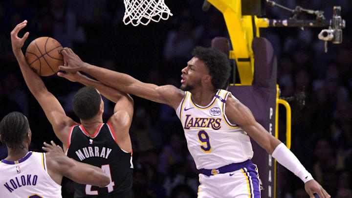 Dec 8, 2024; Los Angeles, California, USA; Los Angeles Lakers guard Bronny James (9) blocks a shot by Portland Trail Blazers forward Kris Murray (24) in the second half at Crypto.com Arena. Mandatory Credit: Jayne Kamin-Oncea-Imagn Images Dec 8, 2024; Los Angeles, California, USA; Los Angeles Lakers guard Bronny James (9) blocks a shot by Portland Trail Blazers forward Kris Murray (24) in the second half at Crypto.com Arena. Mandatory Credit: Jayne Kamin-Oncea-Imagn Images