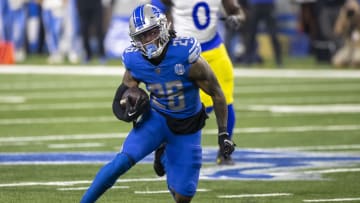 Jan 14, 2024; Detroit, Michigan, USA; Detroit Lions running back Jahmyr Gibbs (26) runs during the first half of a 2024 NFC wild card game against the Los Angeles Rams at Ford Field. Mandatory Credit: David Reginek-USA TODAY Sports