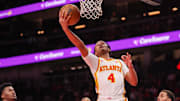 Dec 2, 2024; Atlanta, Georgia, USA; Atlanta Hawks guard Kobe Bufkin (4) shoots against the New Orleans Pelicans in the second quarter at State Farm Arena.