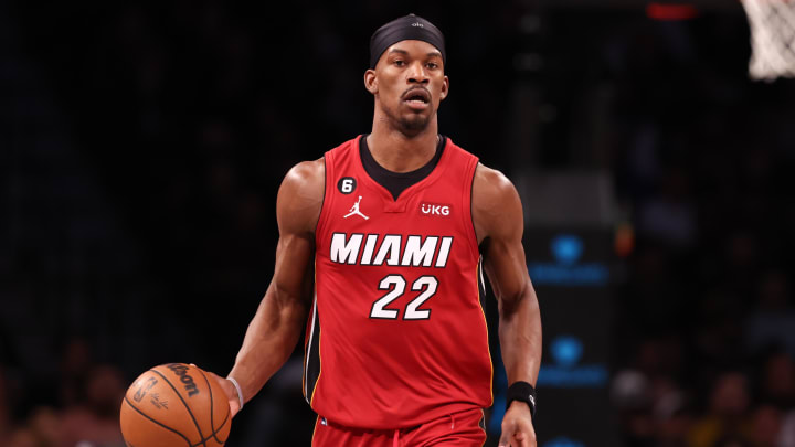 Feb 15, 2023; Brooklyn, New York, USA; Miami Heat forward Jimmy Butler (22) dribbles up court during the first half against the Brooklyn Nets at Barclays Center. Mandatory Credit: Vincent Carchietta-USA TODAY Sports