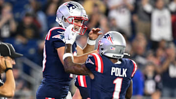 Aug 15, 2024; Foxborough, Massachusetts, USA; New England Patriots quarterback Drake Maye (10) celebrates with wide receiver Ja'Lynn Polk (1) after scoring a touchdown against the Philadelphia Eagles during the first half at Gillette Stadium. Mandatory Credit: Brian Fluharty-Imagn Images