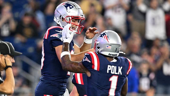 Aug 15, 2024; Foxborough, Massachusetts, USA; New England Patriots quarterback Drake Maye (10) celebrates with wide receiver Ja'Lynn Polk (1) after scoring a touchdown against the Philadelphia Eagles during the first half at Gillette Stadium. Mandatory Credit: Brian Fluharty-Imagn Images