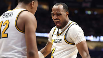 Former Mizzou Tigers guard Tamar Bates (2) celebrates with a teammate during a game versus the Oklahoma Sooners last season.