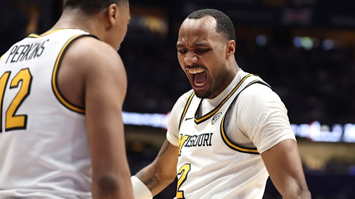 Former Mizzou Tigers guard Tamar Bates (2) celebrates with a teammate during a game versus the Oklahoma Sooners last season.