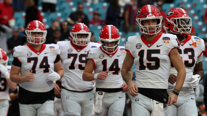 Dec 30, 2023; Miami Gardens, FL, USA; Georgia Bulldogs quarterback Carson Beck (15) takes the field before the 2023 Orange Bowl against the Florida State Seminoles at Hard Rock Stadium. Mandatory Credit: Nathan Ray Seebeck-USA TODAY Sports