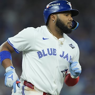 Nov 1, 2025; Toronto, Ontario, CAN; Toronto Blue Jays first baseman Vladimir Guerrero Jr. (27) walks to first base in the third inning against the Los Angeles Dodgers during game seven of the 2025 MLB World Series at Rogers Centre. 