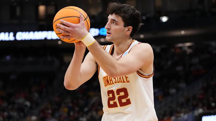Mar 23, 2025; Milwaukee, WI, USA;  Iowa State Cyclones forward Milan Momcilovic (22) shoots against the Mississippi Rebels during the second half in the second round of the NCAA Tournament at Fiserv Forum. Mandatory Credit: Jeff Hanisch-Imagn Images