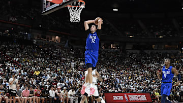 Jul 12, 2025; Las Vegas, NV, USA; Dallas Mavericks forward Cooper Flagg (32) dunks against the San Antonio Spurs in the fourth quarter of their game at Thomas & Mack Center. 