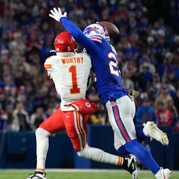 Nov 2, 2025; Orchard Park, New York, USA; Buffalo Bills safety Cole Bishop (24) breaks a pass intended for Kansas City Chiefs wide receiver Xavier Worthy (1) in the second quarter at Highmark Stadium. Mandatory Credit: Gregory Fisher-Imagn Images