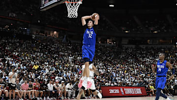 Jul 12, 2025; Las Vegas, NV, USA; Dallas Mavericks forward Cooper Flagg (32) dunks against the San Antonio Spurs in the fourth quarter of their game at Thomas & Mack Center. Mandatory Credit: Candice Ward-Imagn Images