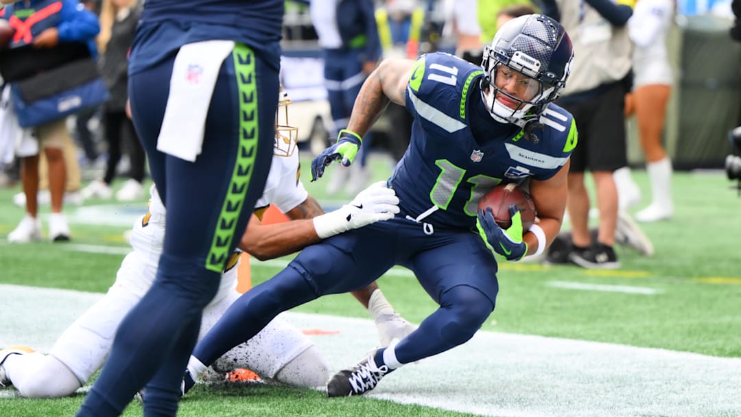 Seattle Seahawks wide receiver Jaxon Smith-Njigba scores a touchdown during the first quarter against the New Orleans Saints at Lumen Field on Sept. 21, 2025.