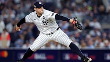 Oct 30, 2024; New York, New York, USA; New York Yankees pitcher Tommy Kahnle (41) pitches during the eighth inning against the Los Angeles Dodgers in game four of the 2024 MLB World Series at Yankee Stadium. Mandatory Credit: Brad Penner-Imagn Images
