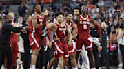 Mar 8, 2025; Auburn, Alabama, USA; Alabama Crimson Tide guard Mark Sears (1) celebrates after making the game winning shot to beat the Auburn Tigers in overtime at Neville Arena. Mandatory Credit: John Reed-Imagn Images