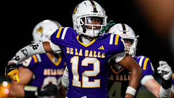 Warren De La Salle defensive back David Williams celebrates an interception against Davison during second half of Prep Kickoff Classic at Wayne State's Tom Adams Field in Detroit on Thursday, August 29, 2024.