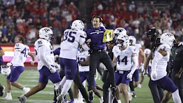 TCU Horned Frogs players and coaches celebrate after a missed Houston Cougars field goal attempt during the fourth quarter at TDECU Stadium.