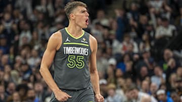 Feb 23, 2025; Minneapolis, Minnesota, USA; Minnesota Timberwolves center Luka Garza (55) reacts after making a three point shot against the Oklahoma City Thunder in the second half at Target Center. Mandatory Credit: Jesse Johnson-Imagn Images