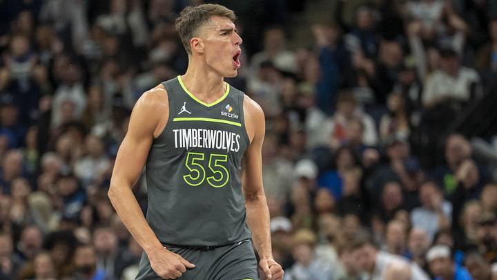 Feb 23, 2025; Minneapolis, Minnesota, USA; Minnesota Timberwolves center Luka Garza (55) reacts after making a three point shot against the Oklahoma City Thunder in the second half at Target Center. Mandatory Credit: Jesse Johnson-Imagn Images
