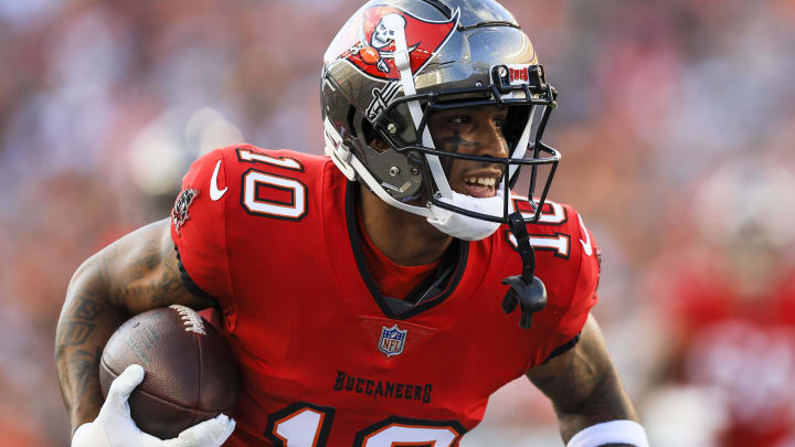 Aug 10, 2024; Cincinnati, Ohio, USA; Tampa Bay Buccaneers wide receiver Trey Palmer runs with the ball against the Cincinnati Bengals in the first half at Paycor Stadium.