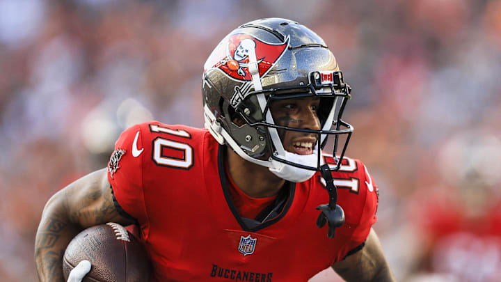 Aug 10, 2024; Cincinnati, Ohio, USA; Tampa Bay Buccaneers wide receiver Trey Palmer (10) runs with the ball against the Cincinnati Bengals in the first half at Paycor Stadium. Mandatory Credit: Katie Stratman-Imagn Images