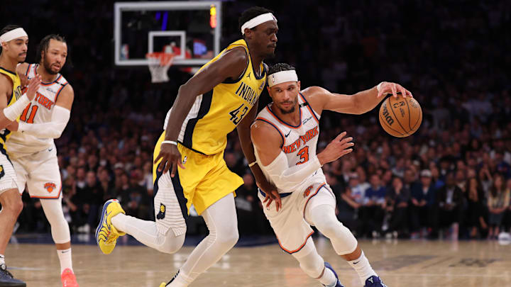 New York Knicks guard Josh Hart controls the ball against Indiana Pacers forward Pascal Siakam in the 2025 NBA Playoffs
