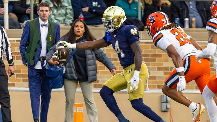 Nov 22, 2025; South Bend, Indiana, USA; Notre Dame Fighting Irish running back Jeremiyah Love (4) scores a touchdown against the Syracuse Orange during the first half at Notre Dame Stadium. Mandatory Credit: Michael Caterina-Imagn Images