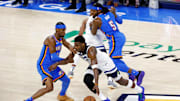 May 28, 2025; Oklahoma City, Oklahoma, USA; Minnesota Timberwolves guard Anthony Edwards (5) drives to the basket against Oklahoma City Thunder guard Shai Gilgeous-Alexander (2) in game five of the western conference finals for the 2025 NBA Playoffs at Paycom Center. Mandatory Credit: Alonzo Adams-Imagn Images