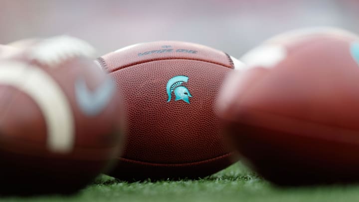 Oct 12, 2019; Madison, WI, USA; Michigan State Spartans logo on footballs during warmups prior to the game against the Wisconsin Badgers at Camp Randall Stadium. Mandatory Credit: Jeff Hanisch-USA TODAY Sports