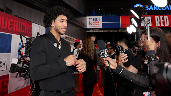 Jun 26, 2024; Brooklyn, NY, USA; Jared McCain is interviewed on the red carpet after arriving for the first round of the 2024 NBA Draft at Barclays Center. Mandatory Credit: Brad Penner-Imagn Images