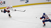 Apr 6, 2025; Elmont, New York, USA;  Washington Capitals left wing Alex Ovechkin (8) scores a goal in the 2nd period against the New York Islanders at UBS Arena. The goal is the 895th of Ovechkin’s career, breaking the NHL all-time career goals record previously held by Wayne Gretzky.at UBS Arena. Mandatory Credit: Geoff Burke-Imagn Images